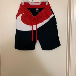 Red black and white Nike shorts